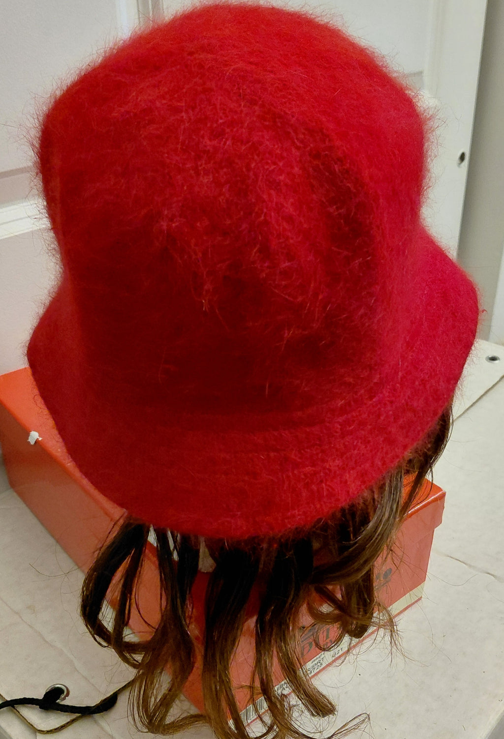Red Hat with short brown Hair