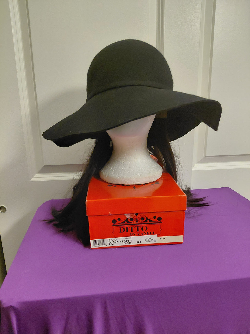 Black floppy hat with black Hair