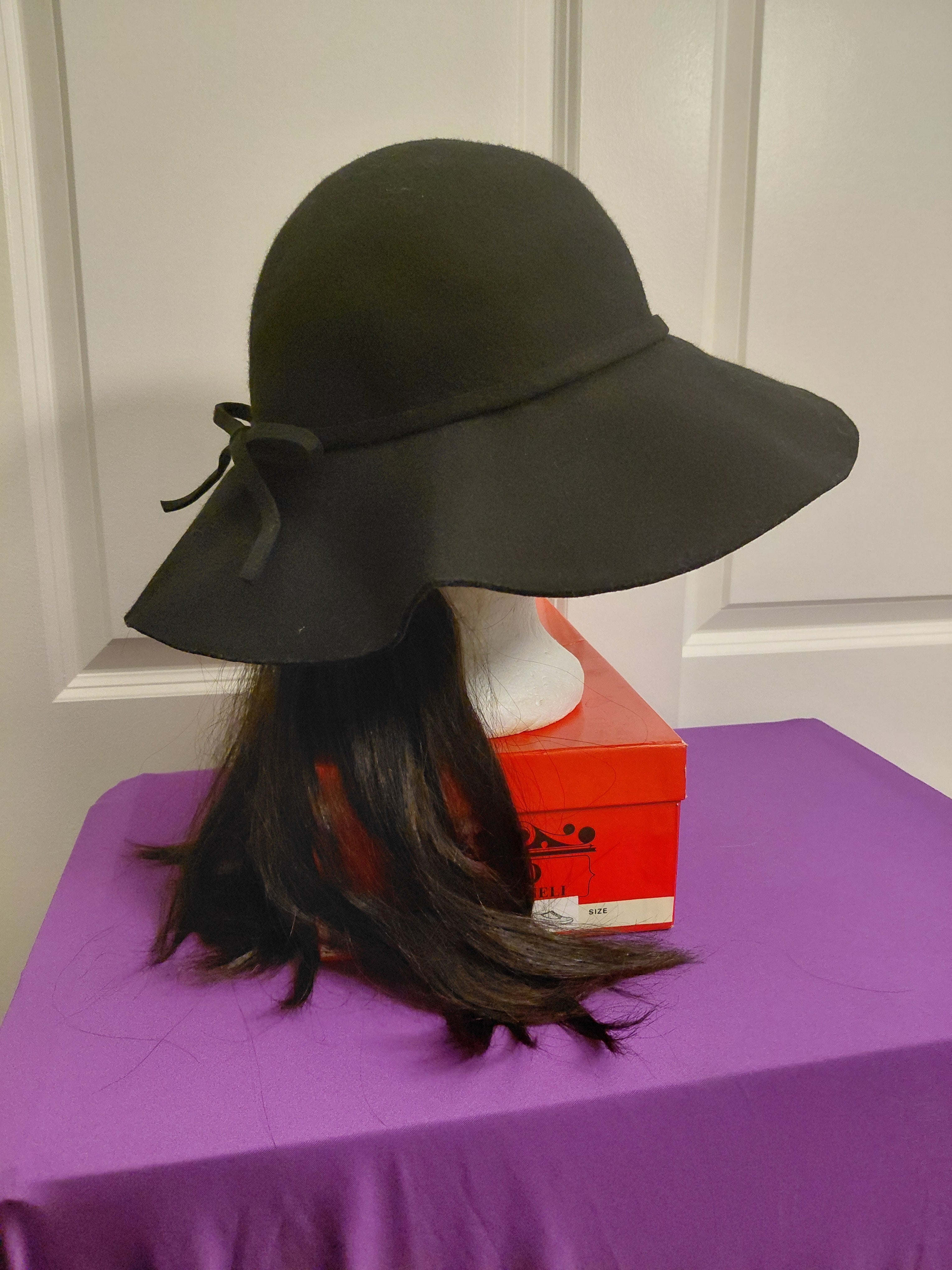 Black floppy hat with black Hair
