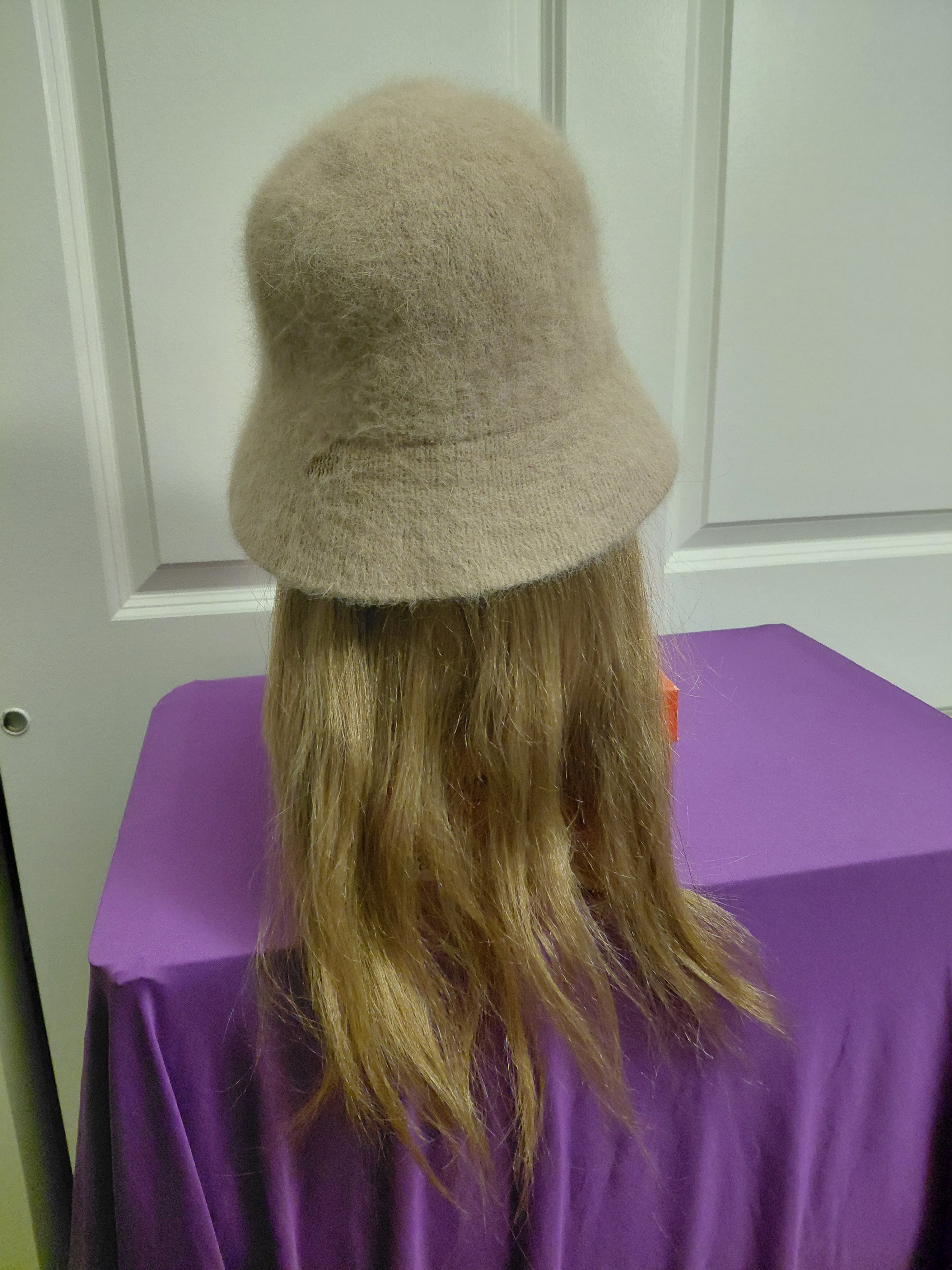 Tan Buckett hat with light Blonde hair
