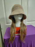 Tan Buckett hat with light Blonde hair