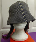 Black and White hat with Bergundy and black hair