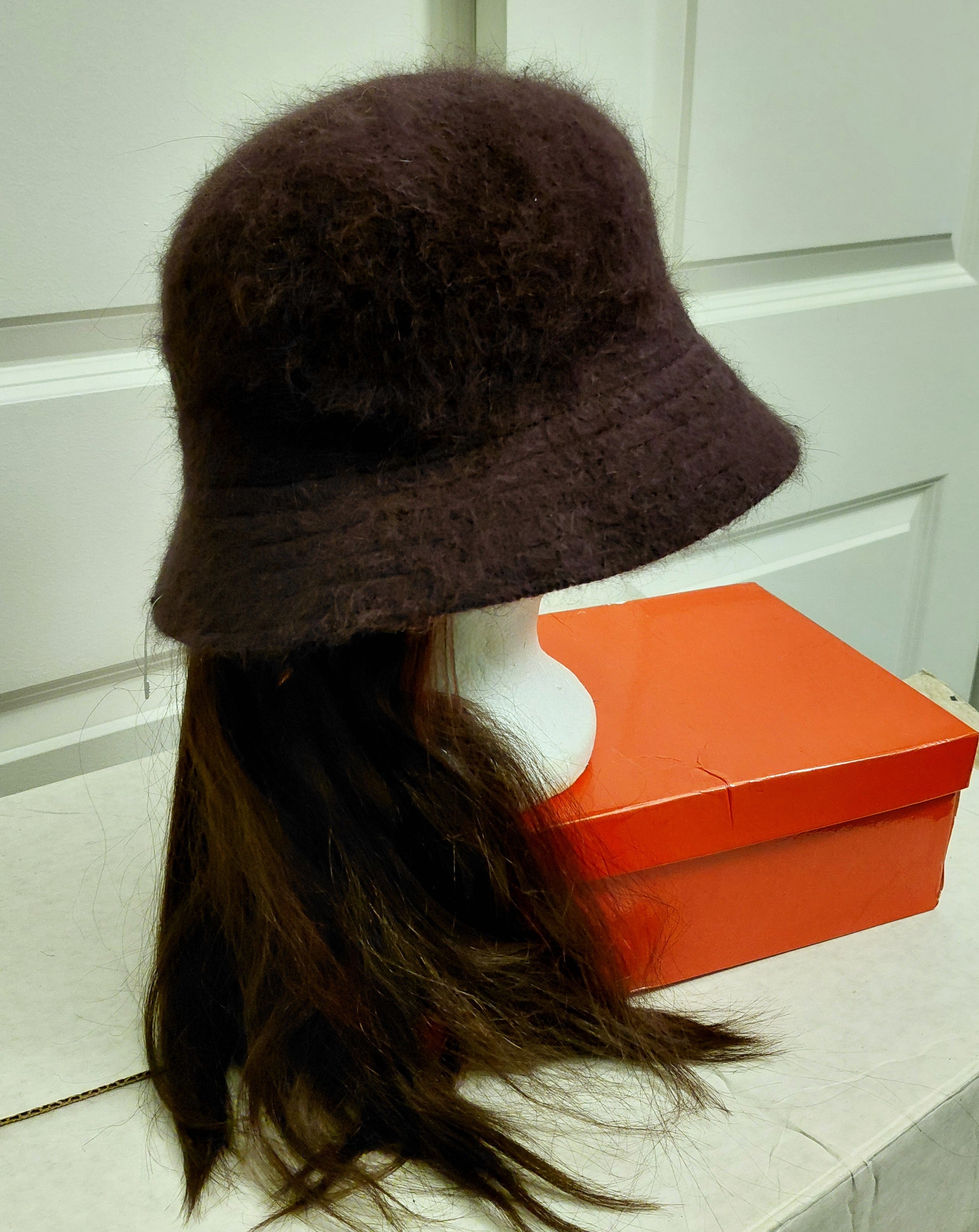 Brown Buckett hat with Brown hair