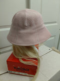 Pink and white hat with Blonde Hair